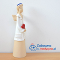 Ceramiczny anioł opiekun medyczny z sercem, figurka opiekun medyczny, prezent dla opiekuna medycznego, aniołek opiekun medyczny, anioł z ceramiki, podziękowanie dla opiekunów medycznych, elegancki prezent dla opiekuna medycznego